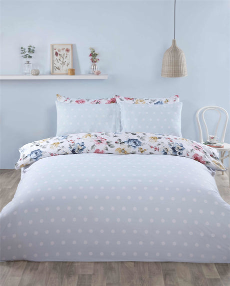 Emilia Duvet Set with popper closure, easycare fabric, showcasing vibrant flowers and coordinating reverse