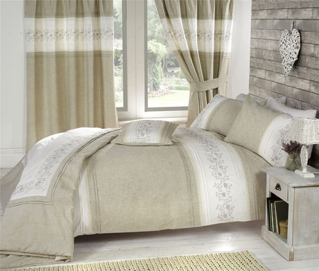 Close-up of Wildberry duvet set displaying detailed embroidered floral design and linen trim with matching pillowcases