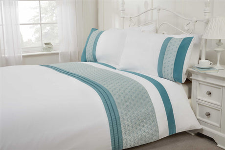 Detailed view of the Anise Duvet Set highlighting the sophisticated star quilted pattern and elegant satin pintuck finishing