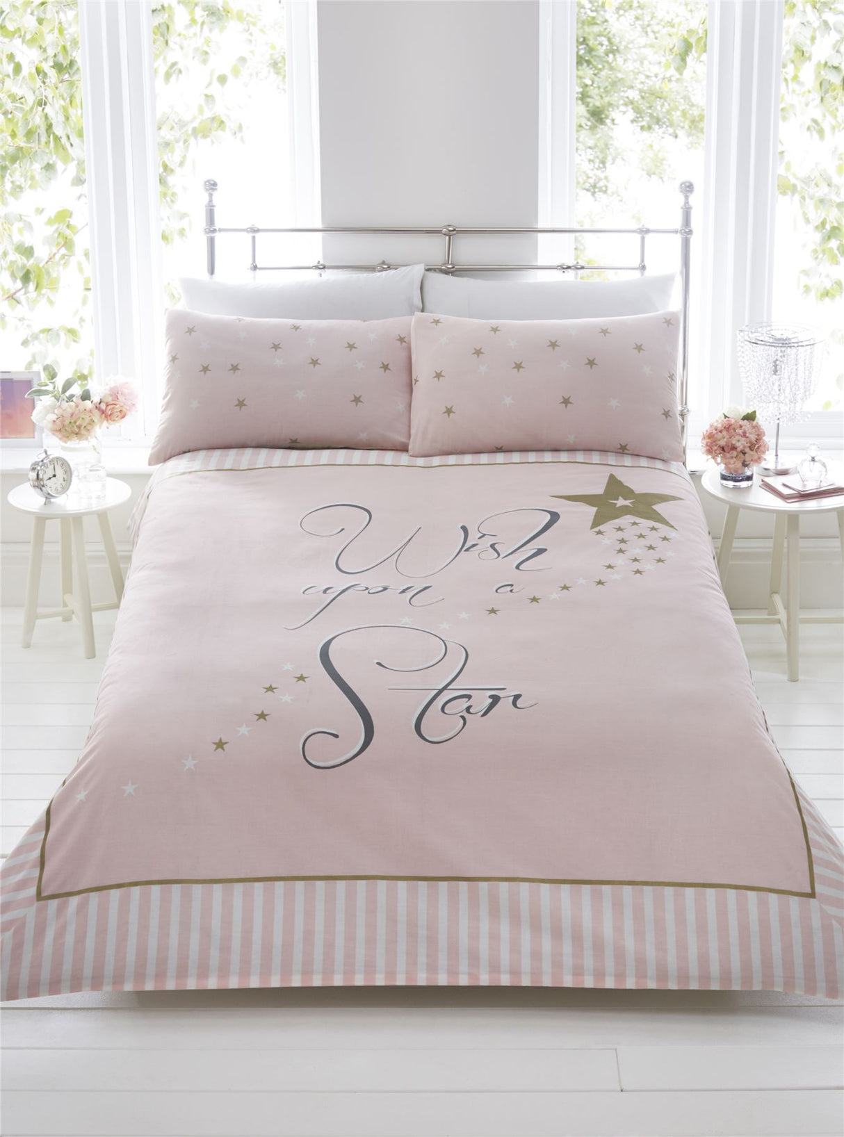 Blush pink duvet set with scrolly writing and gold stars, featuring stripe print border and star speckled pillowcases in single, double, or kingsize Made from easycare fabric with panel printed pillowcases and popper closing mechanism