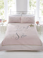 Blush pink duvet set with scrolly writing and gold stars, featuring stripe print border and star speckled pillowcases in single, double, or kingsize Made from easycare fabric with panel printed pillowcases and popper closing mechanism