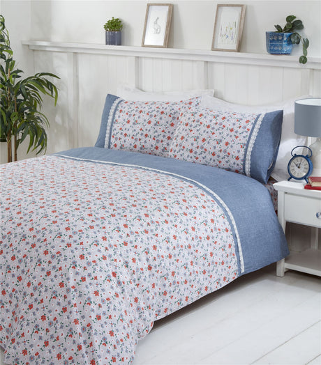 Close-up of the Penelope Duvet Set showcasing elegant spring flowers and vintage lace accents