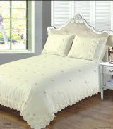 Matching pillowcases with embroidered roses and lace trim in Sophie Duvet Set