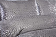 An image of the Bellagio Boudoir Cushion in Silver with silver foil detailing, measuring 30x50cm
