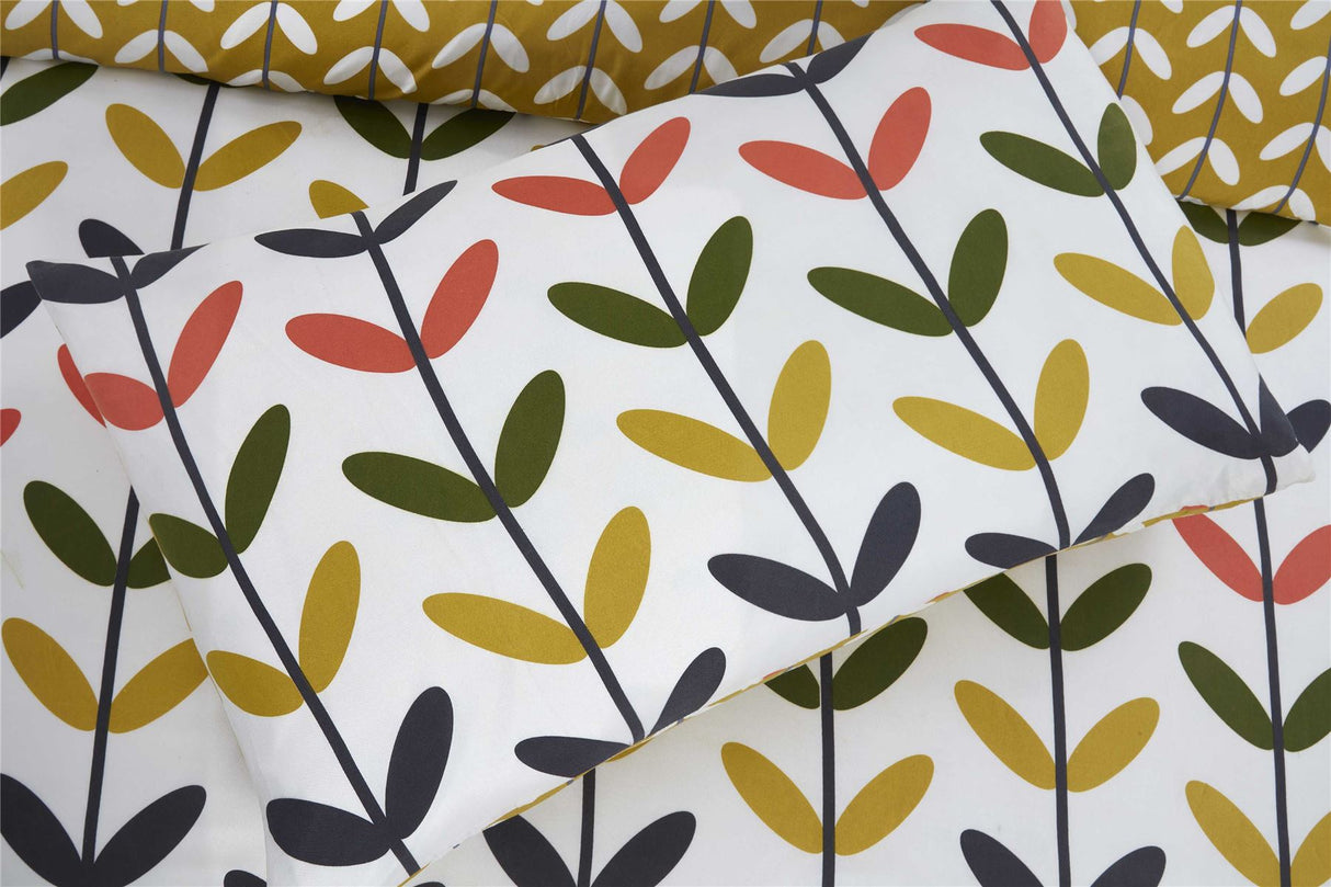 Stylish Jules Duvet Set with fully reversible design, matching pillowcases, and popper closure for convenient use