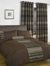 Eyelet header curtains with a touch of sparkly lurex thread