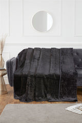 Close-up of the soft, plush ribbed mink fabric showcasing its texture and sheen