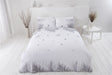 Scattered small tropical leaves on the reverse side of the eco-friendly duvet set, perfect for a fresh bedroom look