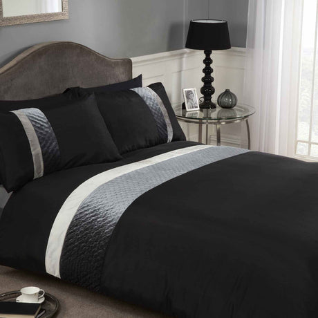 A dark, velvet duvet set with quilted banded detail, button closure, available in single, kingsize, and superking sizes with matching pillowcases