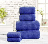 A soft, absorbent waffle towel in a warm beige color