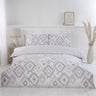Elegant reversible Ikat duvet cover set with matching pillowcases showcasing vibrant bohemian patterns