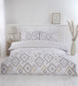 Elegant reversible Ikat duvet cover set with matching pillowcases showcasing vibrant bohemian patterns