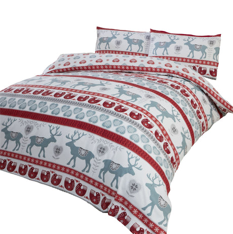 Matching pillowcases with reindeer and hearts pattern in a festive Scandinavian style for a cosy holiday bedroom decor