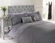 Close-up of the Limoge Duvet Set showing detailed ruffle trim on duvet cover and pillowcases