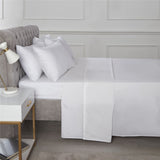 Close-up of a fitted sheet showcasing its smooth, crisp texture and easy-care finish in the Happy Home Essentials range