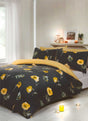 Elegant Darcy Duvet Set featuring watercolour painted flowers on a simple linen-like grey background with a charming printed reverse