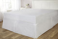 Full-length image of the cream Easy Fit Valance Sheet fitted neatly over a double-sized bed showcasing its elegant and cosy appearance