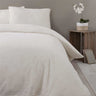 Elegant ivory cream Teddy Fleece Duvet Set featuring a cosy, energy-efficient design and popper closure