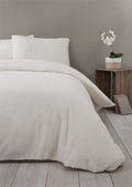 Elegant ivory cream Teddy Fleece Duvet Set featuring a cosy, energy-efficient design and popper closure