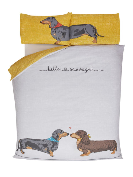 Reversible duvet cover featuring playful dachshund designs and textured ochre reverse for versatile styling