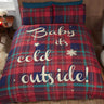 Festive Baby Its Cold Outside duvet set with tartan pattern and slogan, perfect for a snug bedroom ambiance