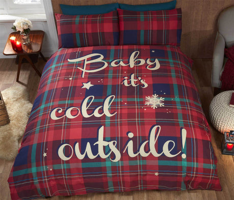 Festive Baby Its Cold Outside duvet set with tartan pattern and slogan, perfect for a snug bedroom ambiance