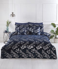 A navy-blue filled cushion featuring silver foil printed leaves from the Como collection, measuring 43x43cm, with finely crafted detailing to enhance bedroom decor