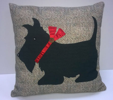 A colourful Hamish Filled Cushion measuring 45x45cm with a vibrant multi-patterned design, perfect for adding comfort and style to any living space