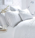 A stunning Papillon Boudoir Cushion adorned with 3D butterfly embroidery in blush pink for a delicate touch