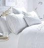 A stunning Papillon Boudoir Cushion adorned with 3D butterfly embroidery in blush pink for a delicate touch