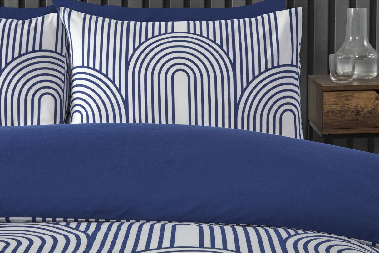 Arrangement of the Arches Duvet Set with matching pillowcases, demonstrating its modern aesthetic in a well-designed bedroom