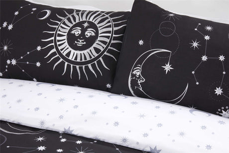 Elegant celestial duvet set showcasing ethereal sun and moon pattern on a rich dark background with star reverse