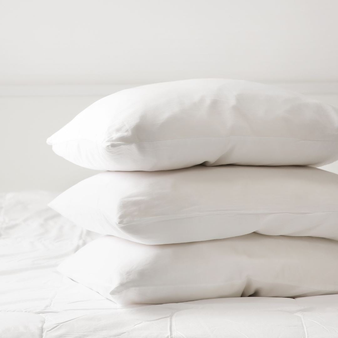 Two fluffy pillows filled with bounceback material for a perfect night's rest