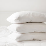 Two fluffy pillows filled with bounceback material for a perfect night's rest