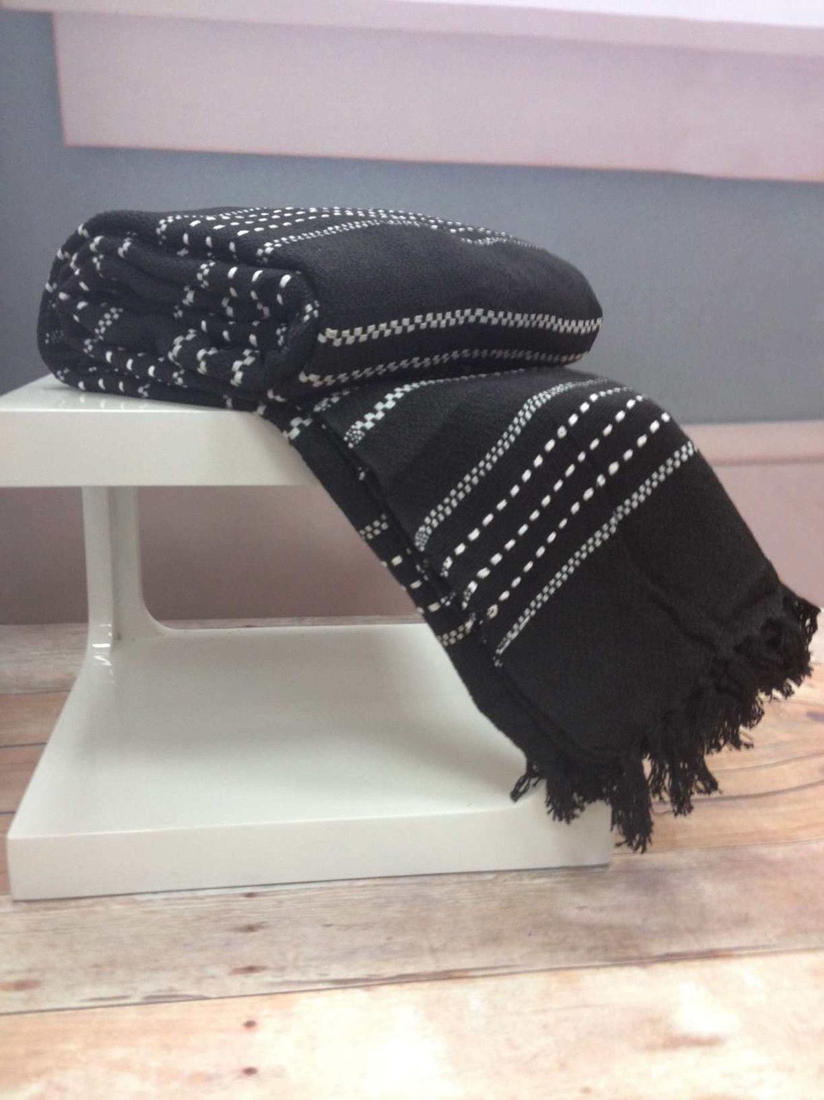 Stitch Stripe Throw in warm cotton with a striped woven pattern