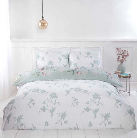 Elegant bedding ensemble with soft high-quality fabric, charming hummingbird pattern, and matching pillowcases in floral design