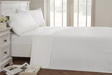 Brightly coloured brushed cotton sheet set in a vibrant red shade, highlighting its easycare and heat retention qualities