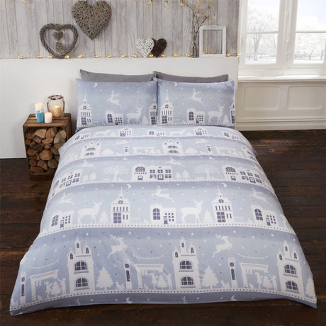 Close-up of the Reindeer Road design on brushed cotton duvet set showcasing a festive townscape with reindeer and Christmas trees in red and grey