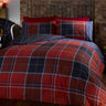 Matching pillowcases included in the Argyle duvet set with popper closing mechanism for secure fastening