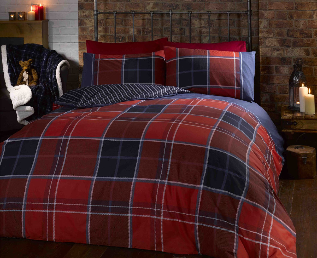Matching pillowcases included in the Argyle duvet set with popper closing mechanism for secure fastening