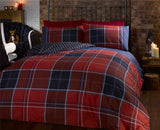 Matching pillowcases included in the Argyle duvet set with popper closing mechanism for secure fastening