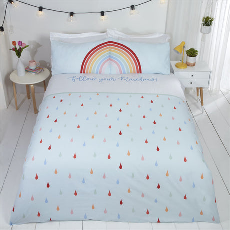Rainbow duvet set featuring colourful rainbow print on rain drop background with matching pillowcases