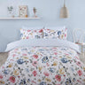 Bright floral bloom duvet cover with blue polka dot reverse, fully reversible design