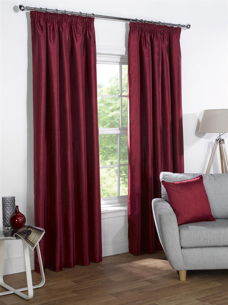 Sophia Filled Cushion coordinates perfectly with matching curtains for a cohesive look
