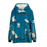 A trendy dog wearing the Skater Dog Fleece Hoodie Multi riding a skateboard outdoors