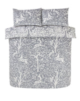 Close-up of the Tatton Duvet Set showcasing woodland animals and natural colours 