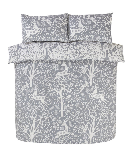 Close-up of the Tatton Duvet Set showcasing woodland animals and natural colours 
