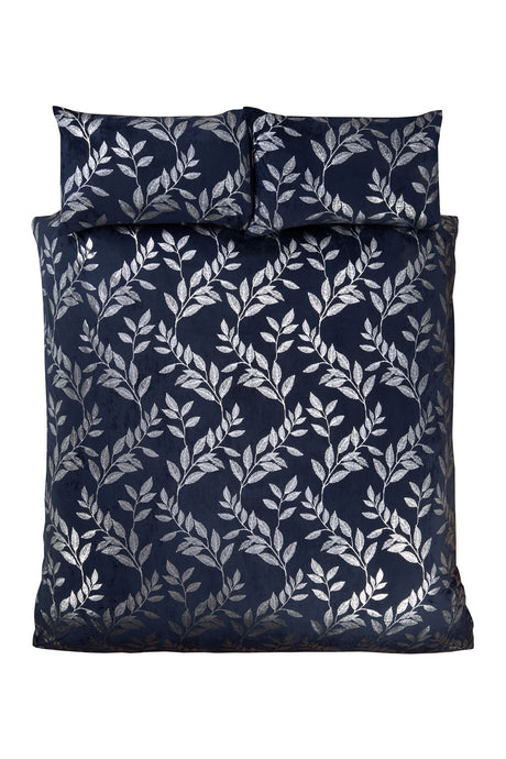 Elegant bedding collection showcasing the refined Como design, including duvet cover and matching pillows in a stylish navy-blue base with detailed foil print