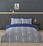 Luxurious Arches Duvet Set featuring a modern geometric pattern in calming ochre or blue