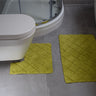 Durable and absorbent Kyra pedestal mat with woven diamond design, ideal for bathroom use